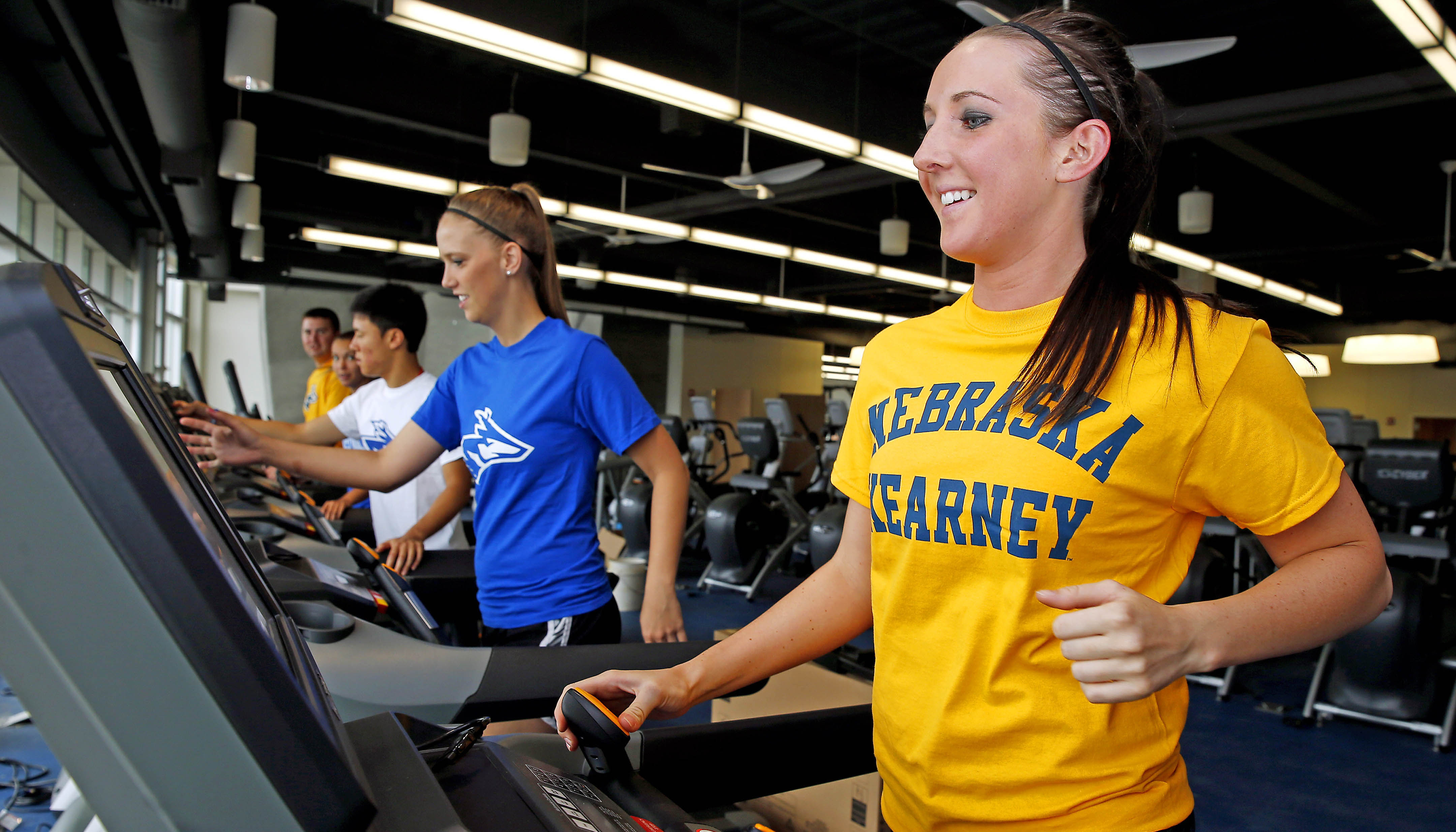 UNK student Sierra Welsh works out in the new campus Wellness Center, which opens to students Aug. 1. The $6.5 million project features a new student fitness center, classrooms, physical activity and wellness lab, and public health research and community outreach space. 