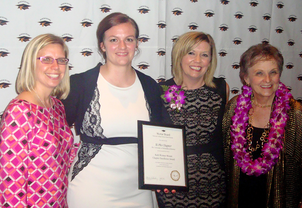 UNK Mortar Board Chapter President Maggie Jackson and Senior Advisor Amber Messersmith, second and third from left respectively, received the Ruth Weimer Mount Chapter Excellence Award at Mortar Board National Conference in Atlanta. Also pictured are Section Coordinator Kristi Okerlund from the University of North Dakota, far left, and president of Mortar Board National Council Martha Starling, far right.