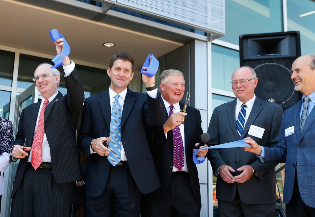 University of Nebraska officials celebrate the ribbon cutting at Thursday’s grand opening celebration of the new Health Science Education Complex on the University of Nebraska at Kearney campus. Pictured, left to right, are: Jeffrey P. Gold, Univeristy of Nebraska Medical Center chancellor; Hank Bounds, University of Nebraska president; Doug Kristensen, UNK chancellor; Charlie Bicak, Senior Vice Chancellor Academic and Student Affairs; and Joe Lang, RDg Planning and Design.