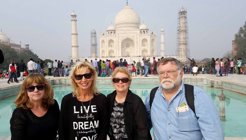 Kearney Rotarians (left to right) Tami Moore, Jake Jacobsen, Carol Bosshardt and Tom Bosshardt stand in front of the Taj Mahal in Agra, India. The four recently went on a Rotary trip to India to help provide solar lamps to high school students.