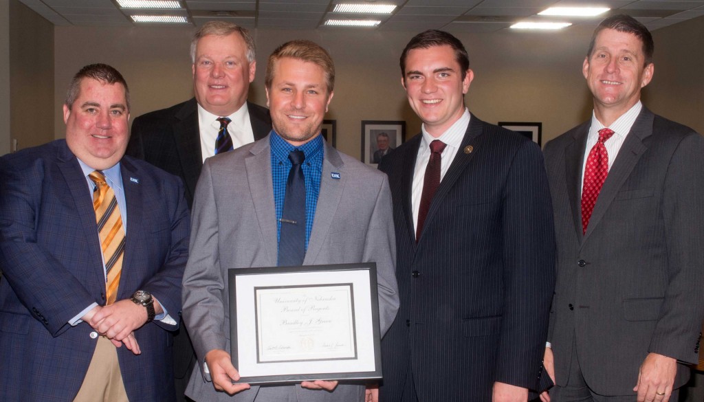 Brad Green, middle, was recognized and given the KUDOS award at Friday’s Board of Regents meeting, which was attended by left to right: UNK Director of Admissions Dusty Newton, UNK Chancellor Doug Kristensen, UNL Student Regent Spencer Hartman and NU President Hank Bounds.