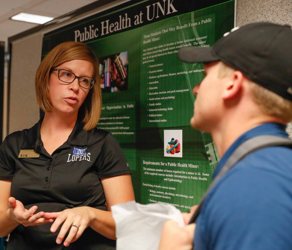 UNK Assistant Director of Health Sciences Elizabeth Stout, left, speaks with Tyan Boyer, a UNK pre-physical therapy major from Plainview at the recent Health Careers Fair. (Photo by Corbey R. Dorsey/UNK Communications)