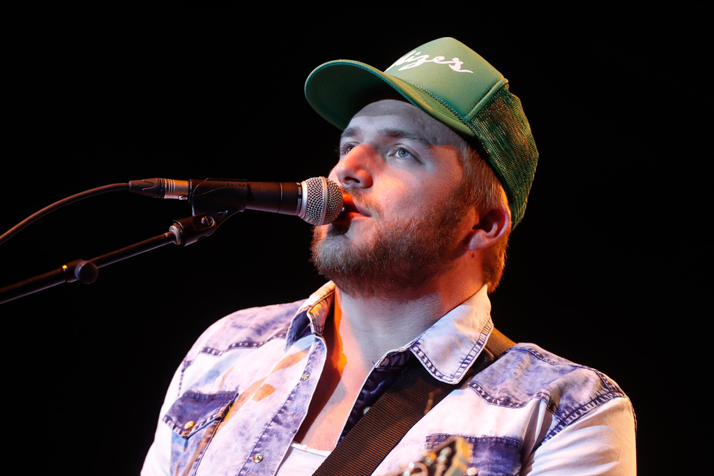 Logan Mize performs Thursday at the UNK Health and Sports Center during the Loper Programming and Activities Council spring concert. (Photo by Corbey R. Dorsey/UNK Communications)