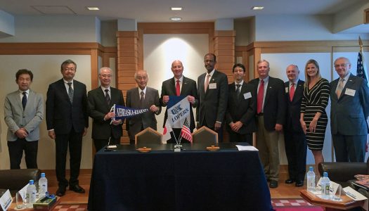 Nebraska Gov. Pete Ricketts, middle, and UNK’s Gilbert Hinga, sixth from left, and Satoshi Machida, seventh from left, meet with Nebraska, U.S. and Japanese dignitaries Monday at the Midwest-U.S. Japan Association conference in Japan. UNK signed a student and faculty exchange agreement at the conference with Toyo University.
