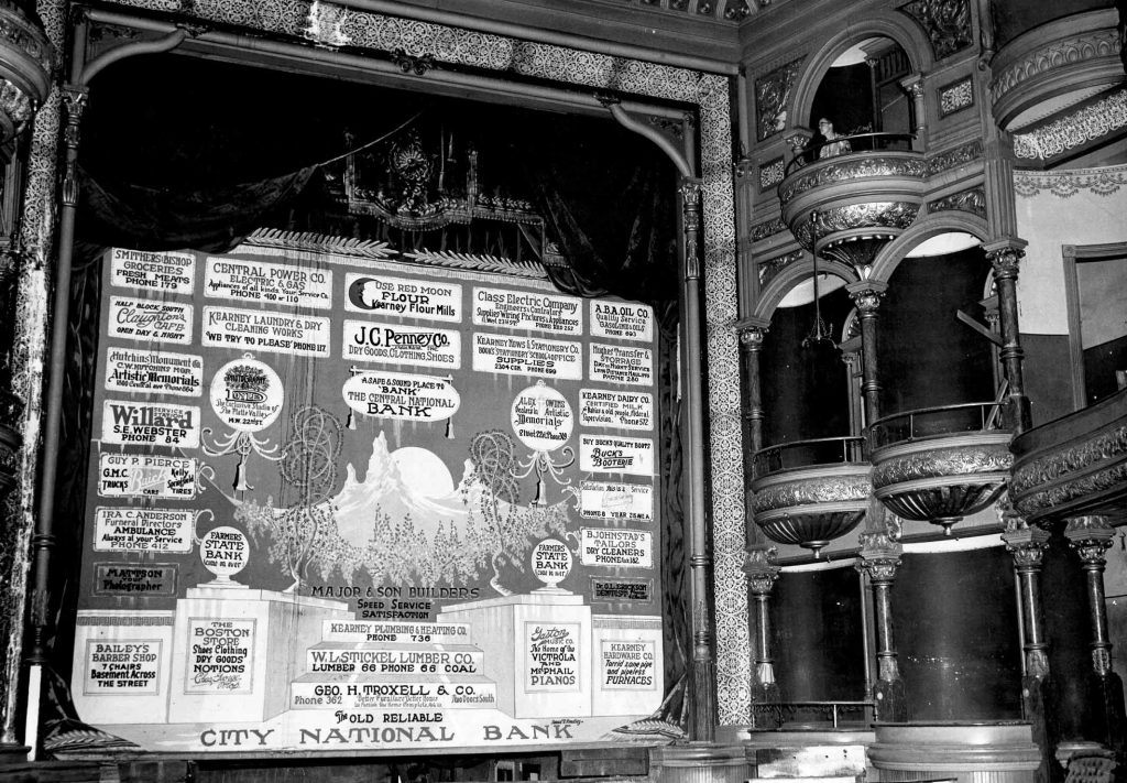 Students in UNK’s Community History and Preservation Class this week are restoring the 82-year-old Kearney Opera House curtain, which graced the stage of the theater from 1935 until the building was demolished in 1954. (Photo courtesy of Kearney Hub "End of an Era" book)