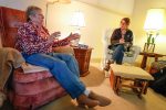 UNK social work student Julia Daro discusses end-of-life plans with Cambridge Court resident Judith Middleton. Daro and other UNK students meet one-on-one and conduct psychosocial assessments of elderly residents. (Photo by Corbey R. Dorsey, UNK Communicatio