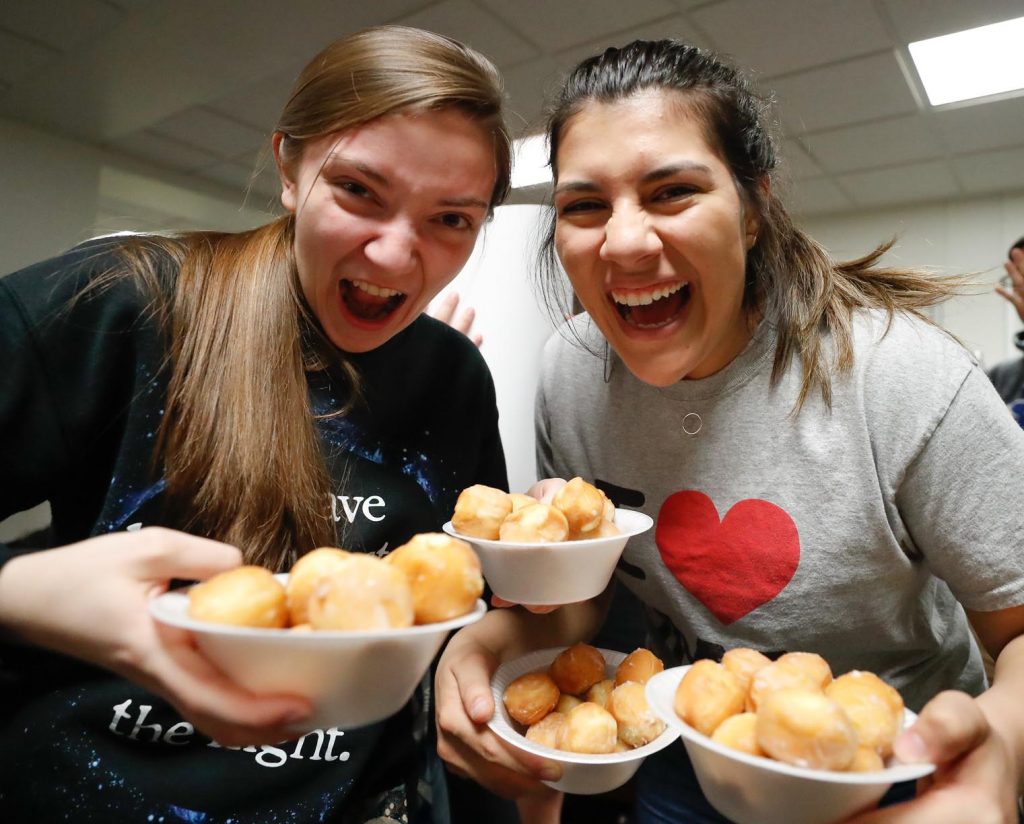 The Office of Residence Life hosted a Community Assembly Night doughnut hole eating contest Tuesday at Mantor Hall. The event also included Rock Star Status and Recyclemania award recognition. (Photos by Corbey R. Dorsey, UNK Communications)