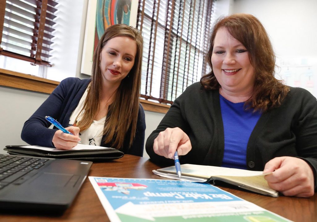 Aliese Hoffman, left, and Lisa Tschauner with UNK’s Center for Entrepreneurship and Rural Development offer a variety of resources for small business owners and aspiring entrepreneurs. The center helps people start new businesses, develop new products and services and reach new audiences, with most of the services offered free of charge. (Photo by Corbey R. Dorsey, UNK Communications)