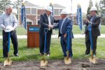 UNK Chancellor Doug Kristensen, left, is congratulated by University of Nebraska Regent Paul Kenney, middle, and Pat Carson of BCDM Architects at Wednesday’s groundbreaking ceremony for UNK’s new $30 million STEM building. (Photo by Corbey R. Dorsey, UNK Communications)