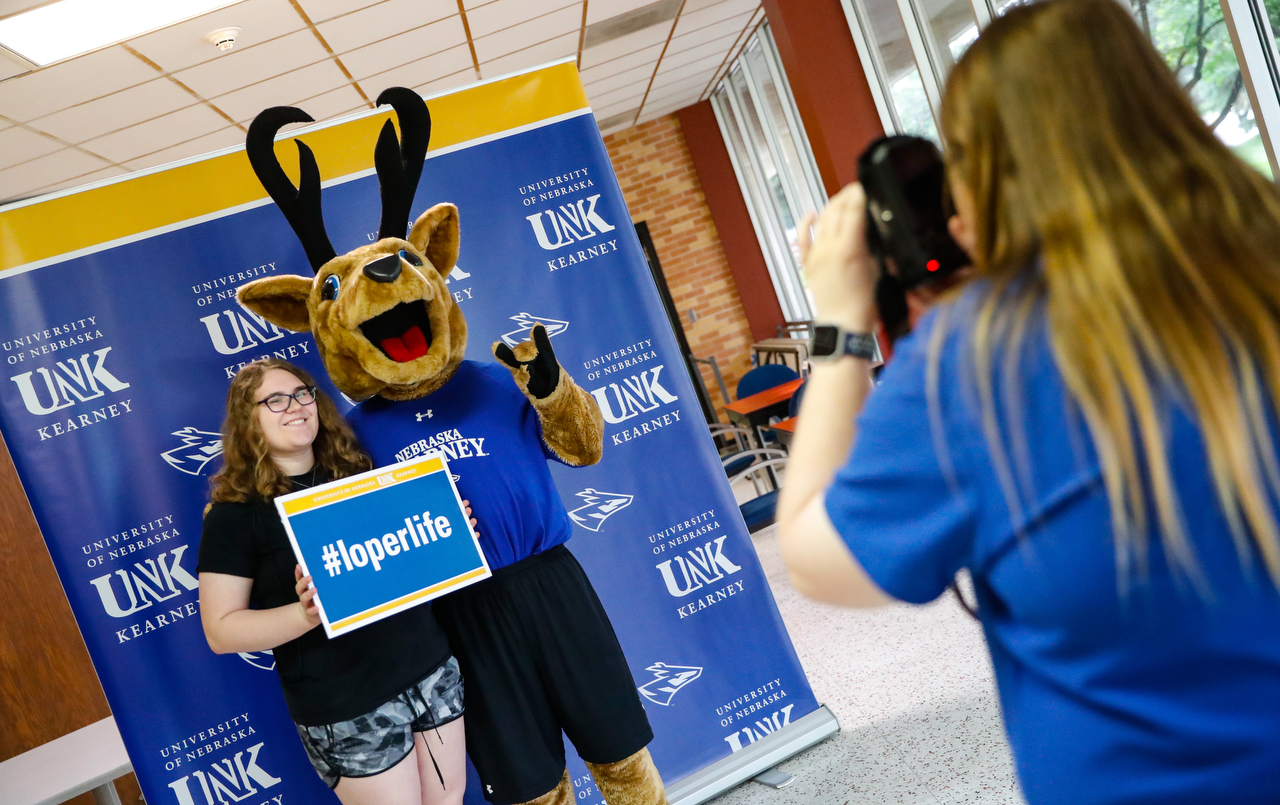 New Student Enrollment is a good time to take the first of many photos with Louie the Loper.