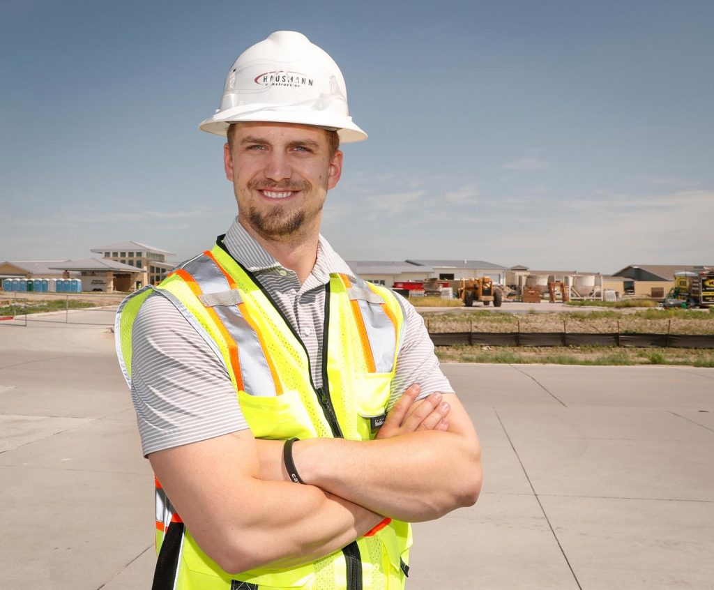 UNK graduate JD Stone, a project superintendent with Hausmann Construction, is currently working on the Central Nebraska Veterans Home complex in northeast Kearney. Stone says a construction management degree from UNK is a “gold star” on resumes. (Photo by Corbey R. Dorsey, UNK Communications)