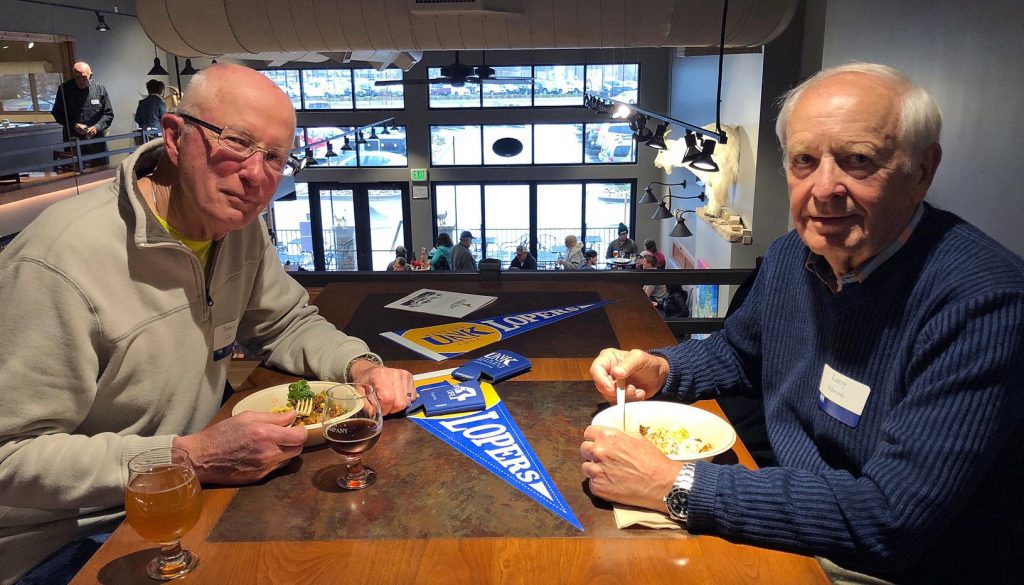 UNK Alumni Patrick Carr, left, and Larry Edwards socialize at a UNK alumni event in Colorado. There are roughly 54,000 UNK graduates living across the globe, with about 70 percent of them residing in Nebraska. In Kearney, approximately 1 in 8 residents has a degree from UNK.