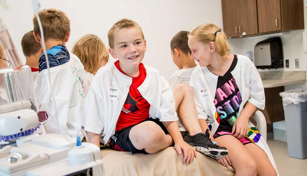 The Early Childhood Education Center also offers summer camp when school is not in session, where children get to explore topics like “No Scare Healthcare,” where they tour the University of Nebraska Medical Center and learn about what it’s like to be a doctor or nurse. (Photo by Tiffany Stoiber, Kearney Hub)