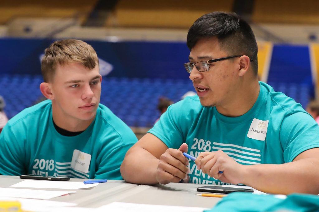 Lexington High School students, from left, Riley Kopf and Harol Molina discuss their business plan for a gym Thursday during New Venture Adventure at UNK. The annual event gives high schoolers a chance to learn about entrepreneurship. (Photo by Corbey R. Dorsey, UNK Communications)