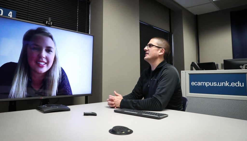 UNK student Shelby Henne of Broken Bow connects remotely with assistant history professor David Vail using technology that enhances UNK’s distance-learning courses. Teleconferencing, online discussion forums and video sharing make it easier for students to take classes through UNK, even if they’re not on campus. (Photo by Corbey R. Dorsey, UNK Communications)