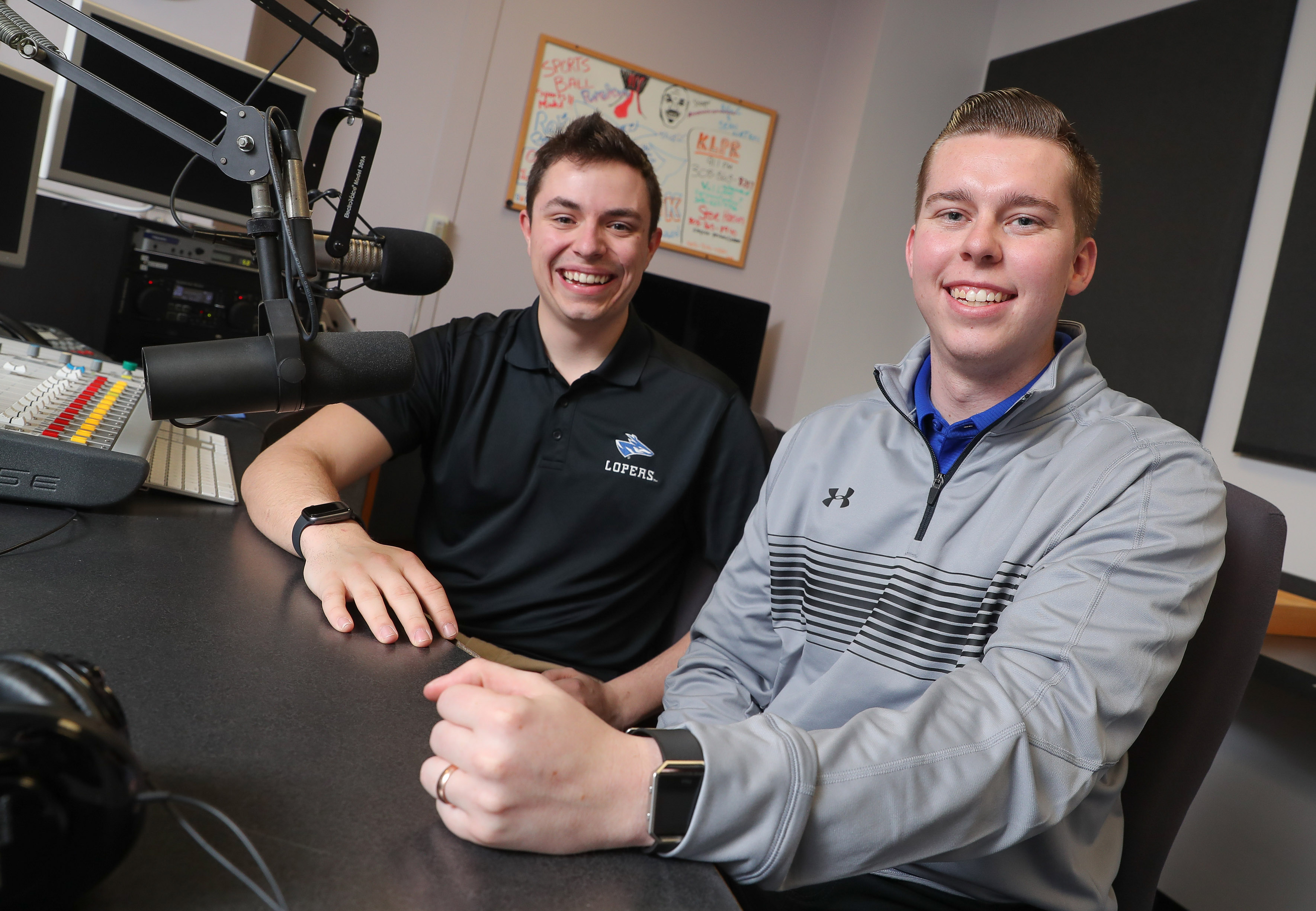 UNK students Austin Jacobsen, left, and Evan Jones are co-sports directors for KLPR 91.1 FM, the campus radio station. (Photo by Corbey R. Dorsey, UNK Communications)
