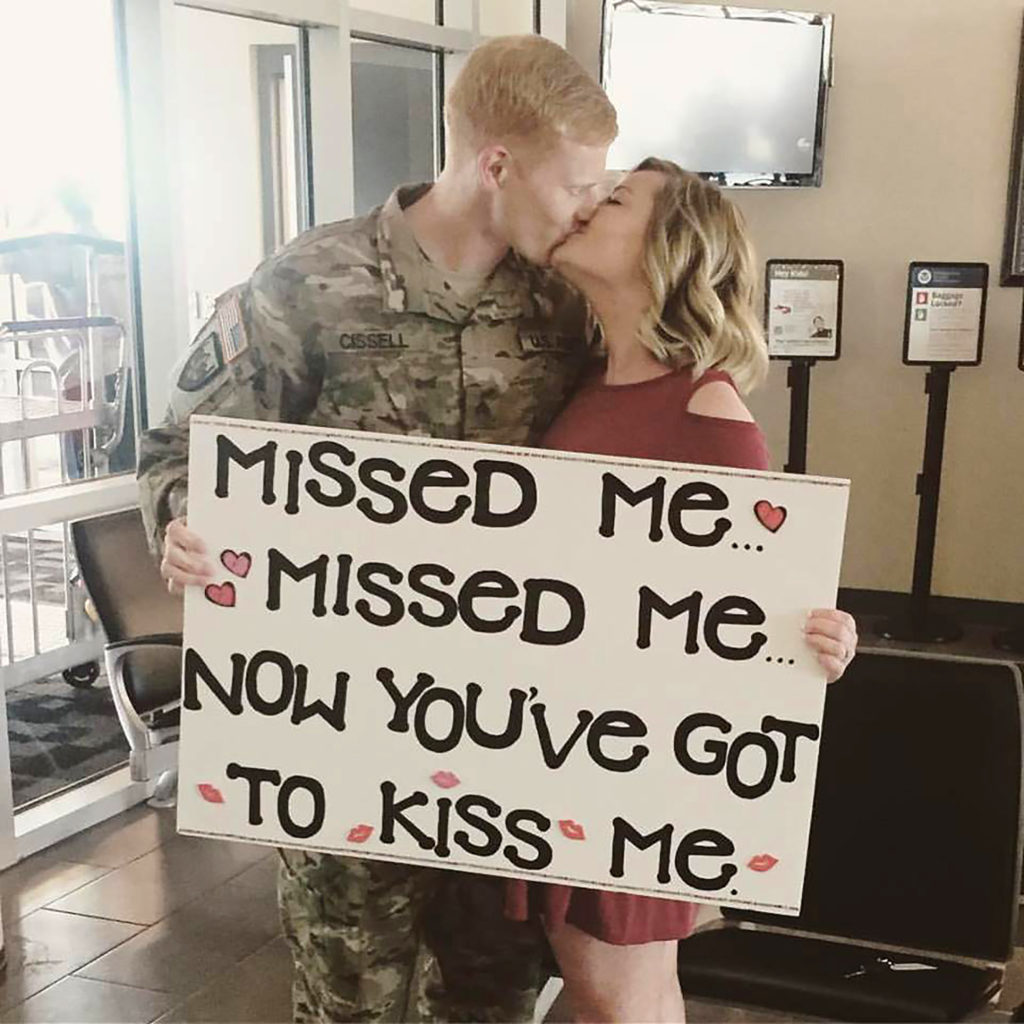 Jerromy Cissell is greeted at Kearney Regional Airport by his wife Blair after returning from his second deployment to Afghanistan in 2016. Cissell has served in the U.S. Army Reserve and National Guard for 10 years. (Courtesy photo)