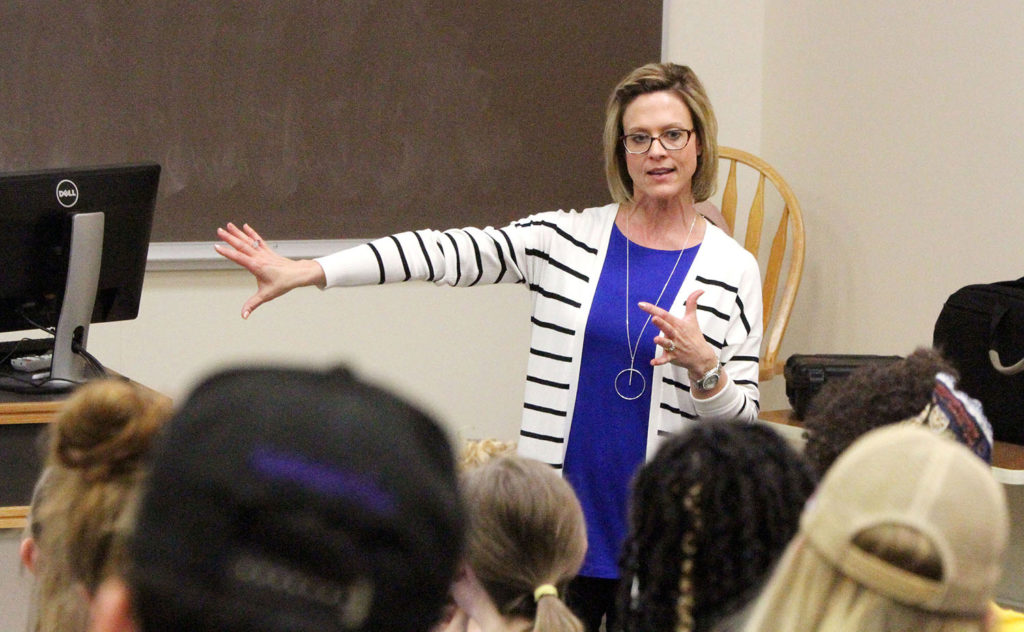 Kiphany Hof, associate director of UNK Counseling and the Women’s Center, leads last week’s active bystander training for UNK student-athletes. The training focused on alcohol abuse, mental health and sexual assault. (Photo by Tyler Ellyson, UNK Communications)