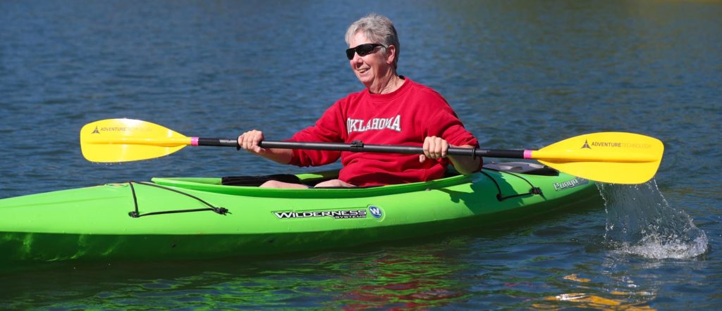 UNK professor of recreation Marta Moorman dedicated her career to “helping people have fun” and making communities a better place to live. Following her retirement in August, she’ll remain active in outdoor activities such as kayaking and long-distance biking. (Photo by Corbey R. Dorsey, UNK Communications)