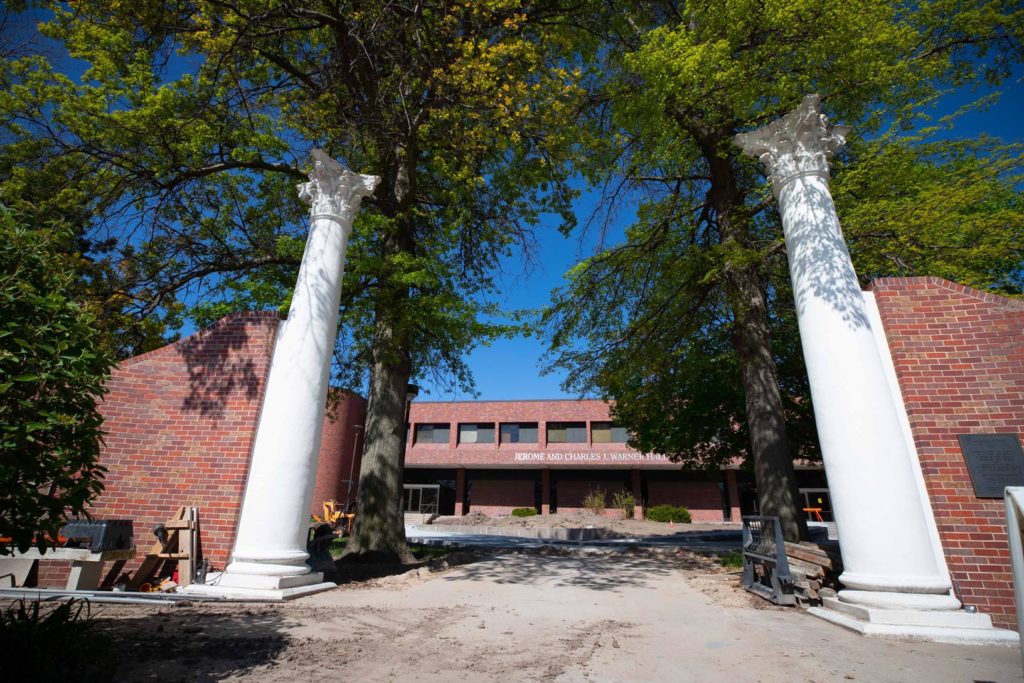 The Warner Hall entryway, dedicated in 1987, features two decorative walls and historic columns, portions of which are original to UNK’s first administration building. UNK will preserve the column capitals and bases to display on campus when the entryway is removed during a construction project that begins next week. (Photo by Corbey R. Dorsey, UNK Communications)
