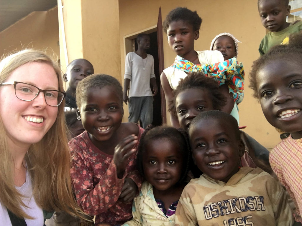 UNK student Michaela Walker snaps a selfie with a group of children in Zambia. (Courtesy photo)