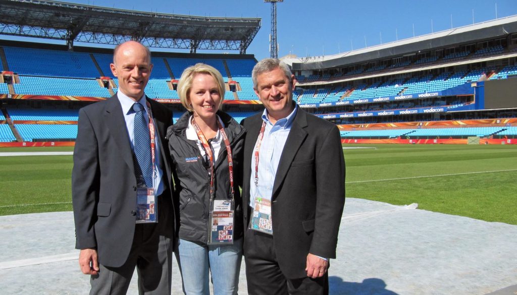 UNK graduate Dick Wiles, right, is pictured at the 2010 FIFA World Cup in South Africa. Wiles oversaw the development and operation of telecommunication and information technology systems at the past seven men’s World Cups. Wiles will discuss his career and the growing role technology plays at major sporting events 11 a.m. Thursday (Sept. 26) at the Nebraskan Student Union Ponderosa Room. (Courtesy photo)