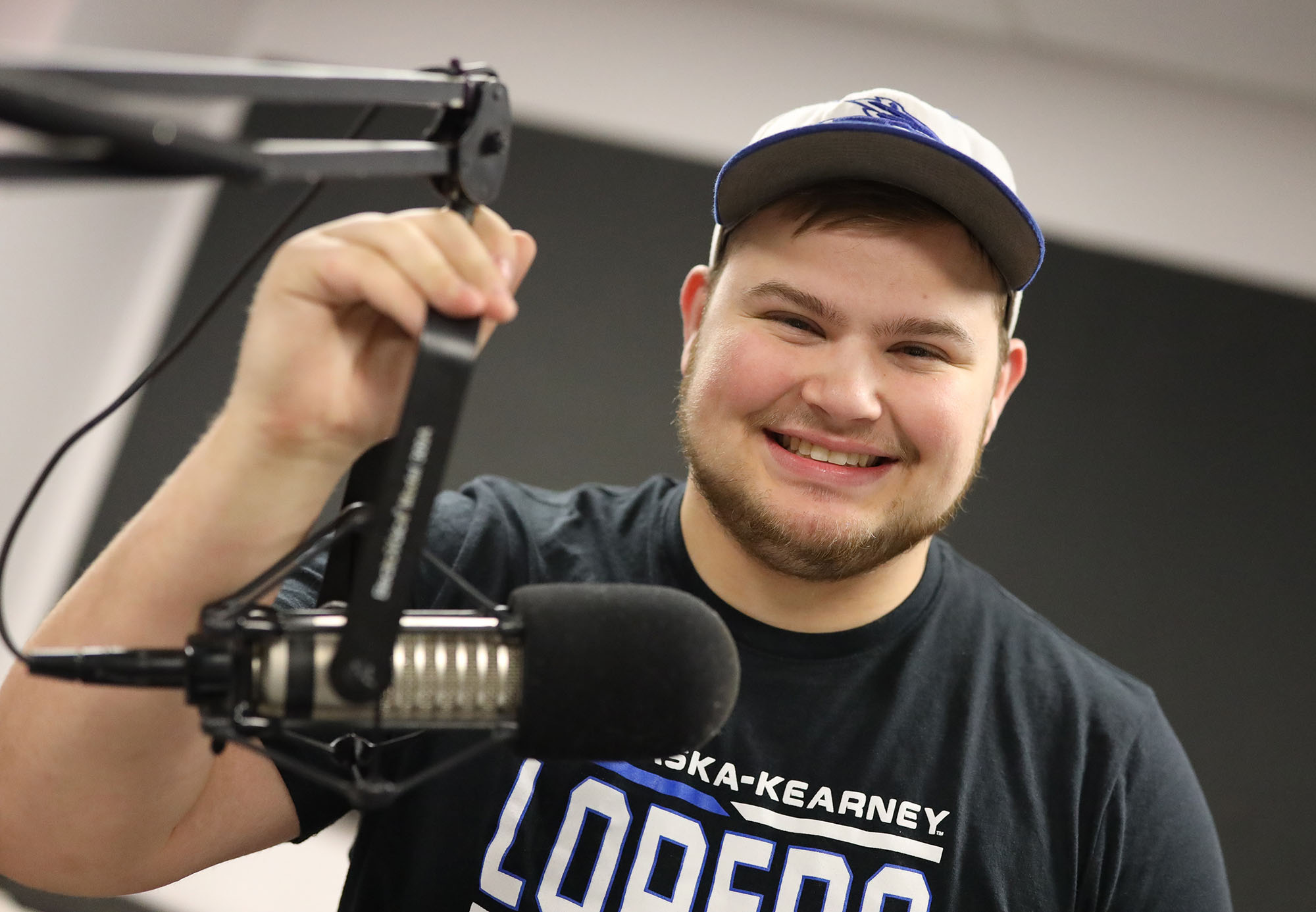 Jacob Roth, a junior from Milford, calls numerous UNK athletic events as a sports broadcaster for the campus radio station, KLPR 91.1 FM. He also hosts “The Jacob Roth Show,” which airs 11 a.m. Tuesdays. (Photo by Corbey R. Dorsey, UNK Communications)