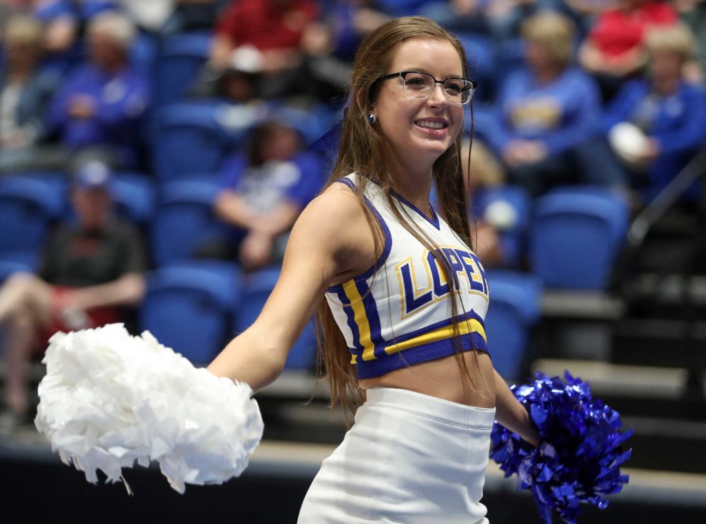 UNK senior Krista Williams of Kearney is co-captain of the Loper cheer team and a member of UNK’s Student-Athlete Advisory Committee. Her family, including parents Bill and Becky, received UNK’s Outstanding Family Award during homecoming festivities last week. (Photo by Corbey R. Dorsey, UNK Communications)