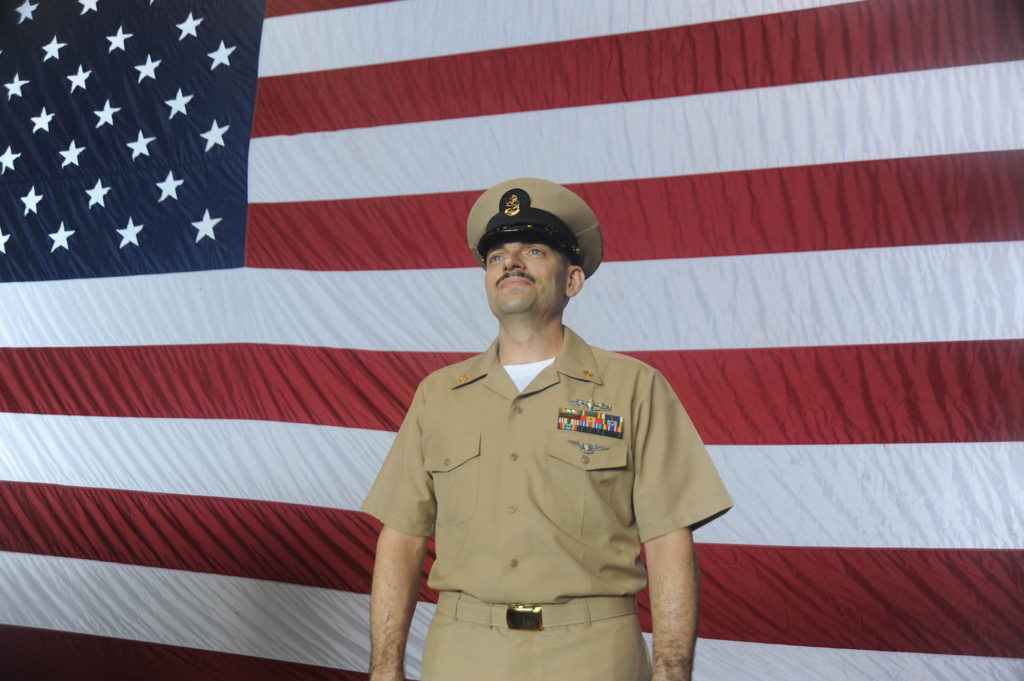 U.S. Navy veteran Phil Heun is pictured after he was promoted to chief petty officer on board the USS Enterprise during a September 2013 deployment to the Middle East. (Courtesy photo)