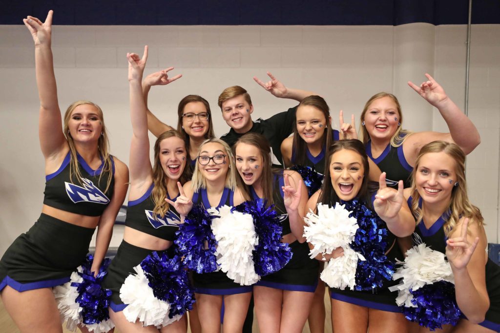 The UNK cheer squad supported the Lopers Saturday during the NCAA Division II women’s volleyball championship at the Auraria Event Center in Denver. Fayth Jackson, front row, second from right, called the experience “one of the best things I’ve ever gotten to do.” (Photo by Corbey R. Dorsey, UNK Communications)