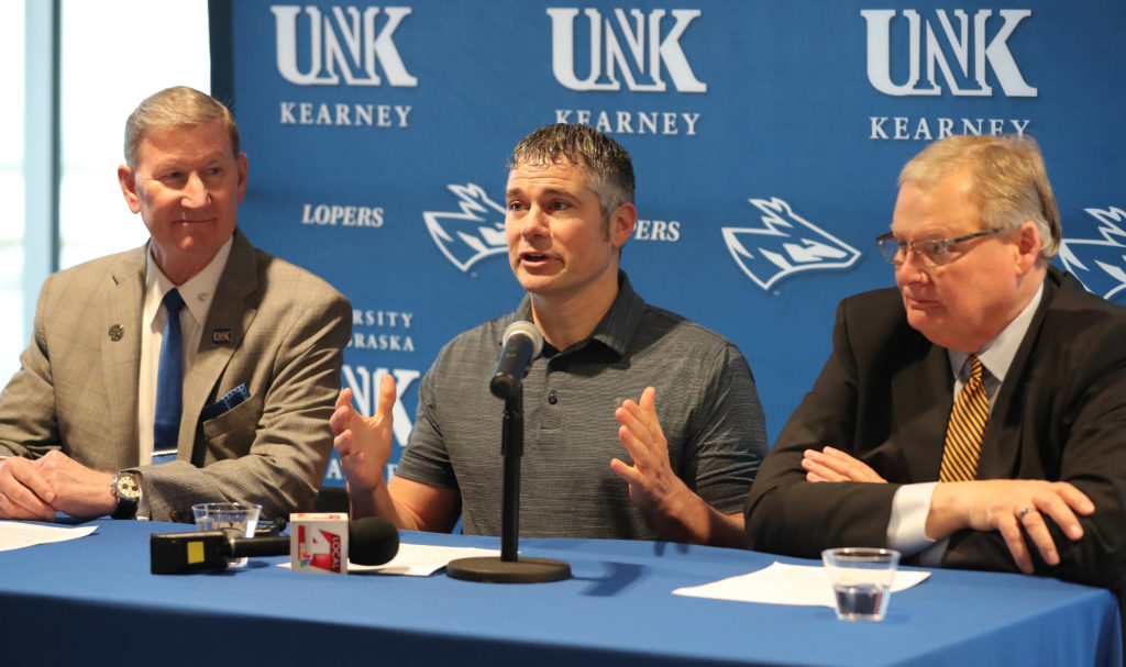 Investor Scott Rief, middle, University of Nebraska President Ted Carter, left, and UNK Chancellor Doug Kristensen discuss the Millennium Housing project at a Monday news conference. The $48 million privately funded development is being built at UNK’s University Village.