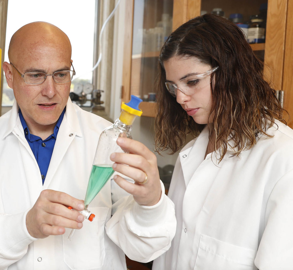UNK associate chemistry professor Allen Thomas and junior chemistry major Hannah Way have been working on research together since spring 2018. “She’s one of the hardest-working research students I’ve had," Thomas said. (Photo by Corbey R. Dorsey, UNK Communications)
