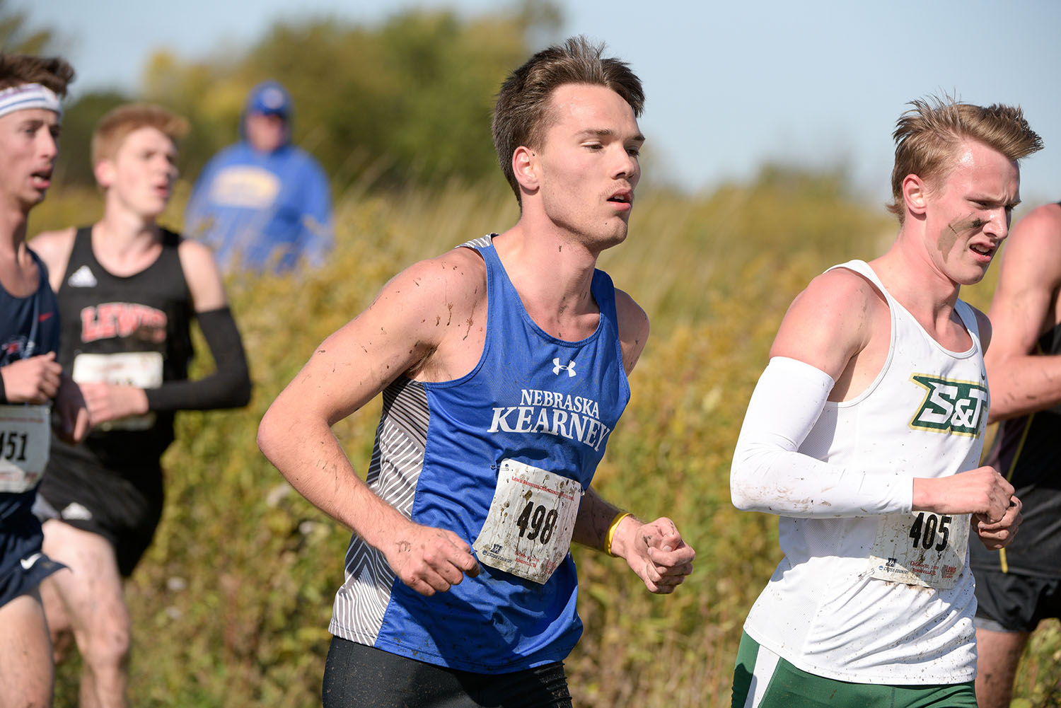 Nate Pierce, center, competed on the UNK cross country and track teams while maintaining a 3.6 GPA. (Steve Woltmann Photography)