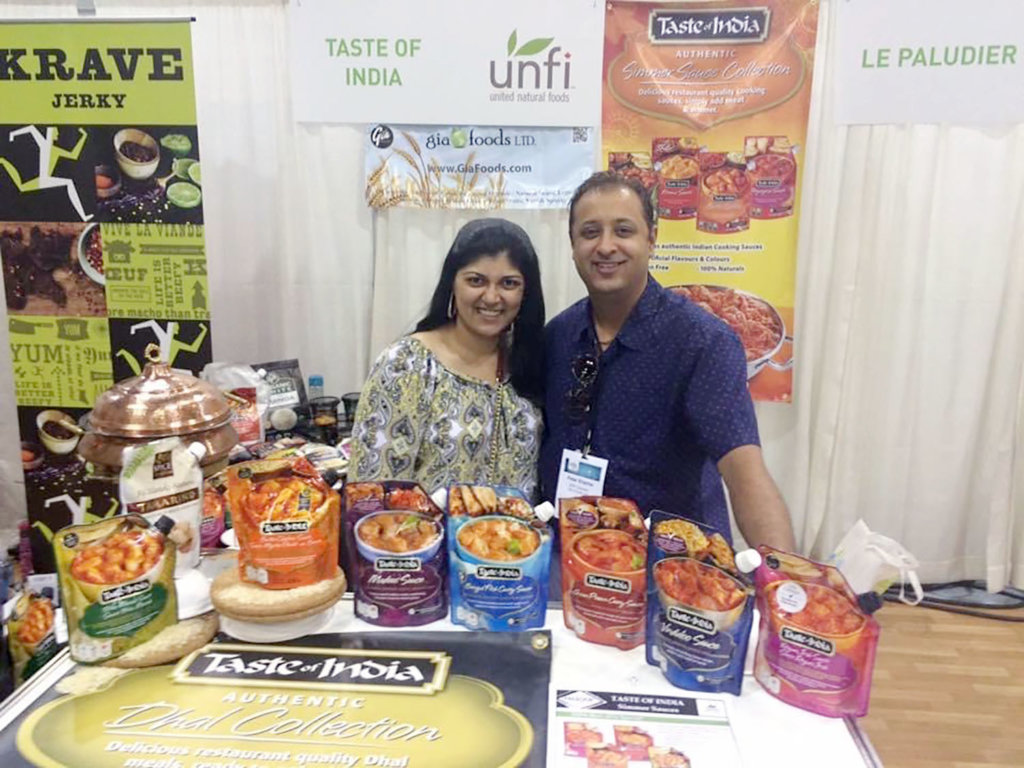 Tanya Wasson is pictured at an international food show last summer during her internship with Gia Foods. (Courtesy photo)
