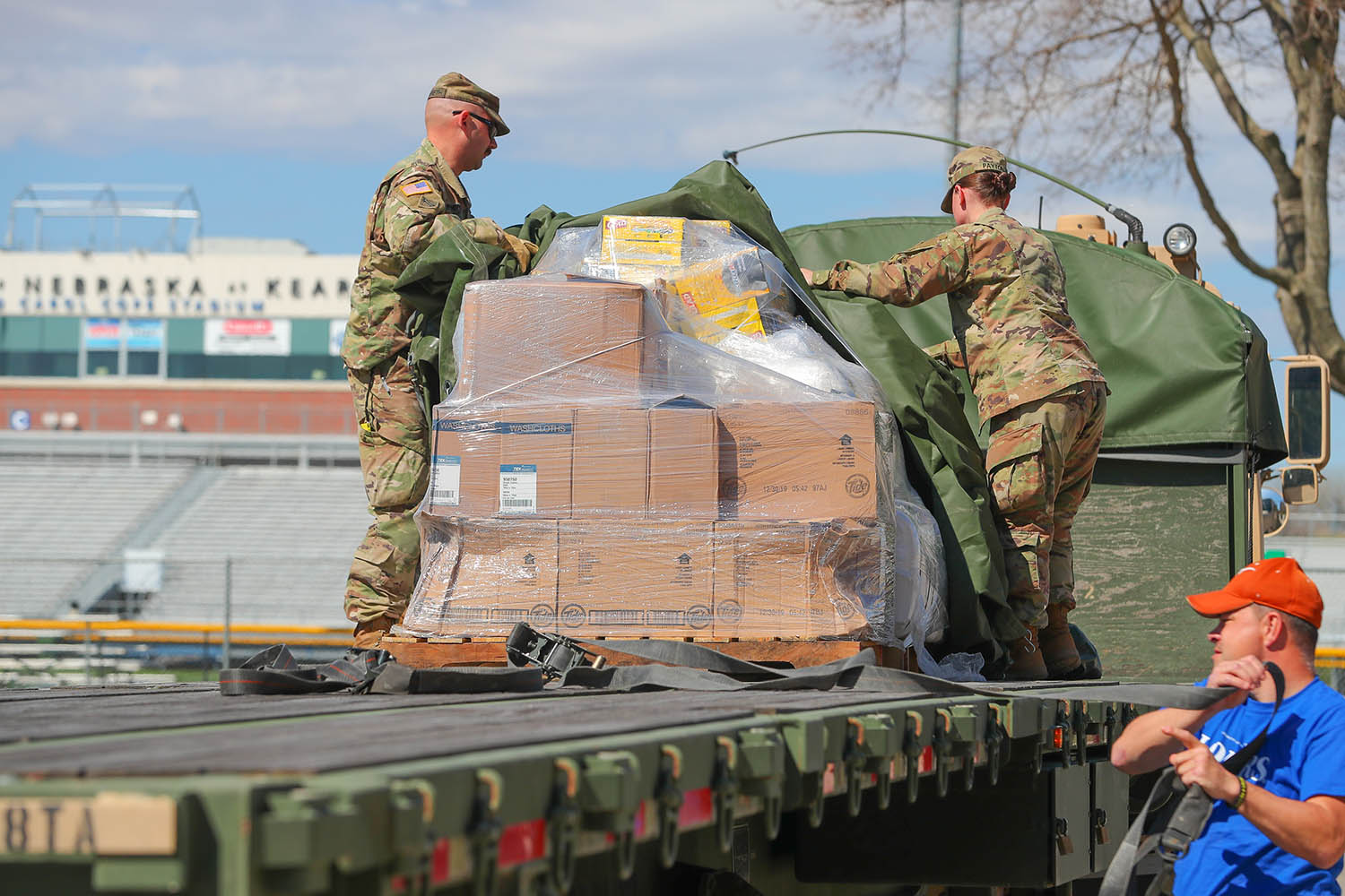 Nebraska National Guard members deliver supplies to the COVID-19 housing site on the UNK campus.