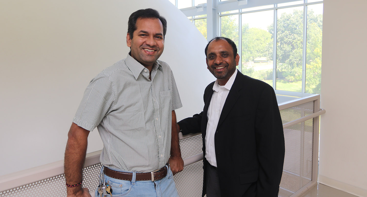 UNK associate chemistry professor Mahesh Pattabiraman, left, and UNK graduate Rakesh Srivastava are collaborating on a research project funded by the Nebraska Department of Economic Development. They hope to develop a light-activated disinfectant for prosthetic limbs. (Photo by Todd Gottula, UNK Communications)