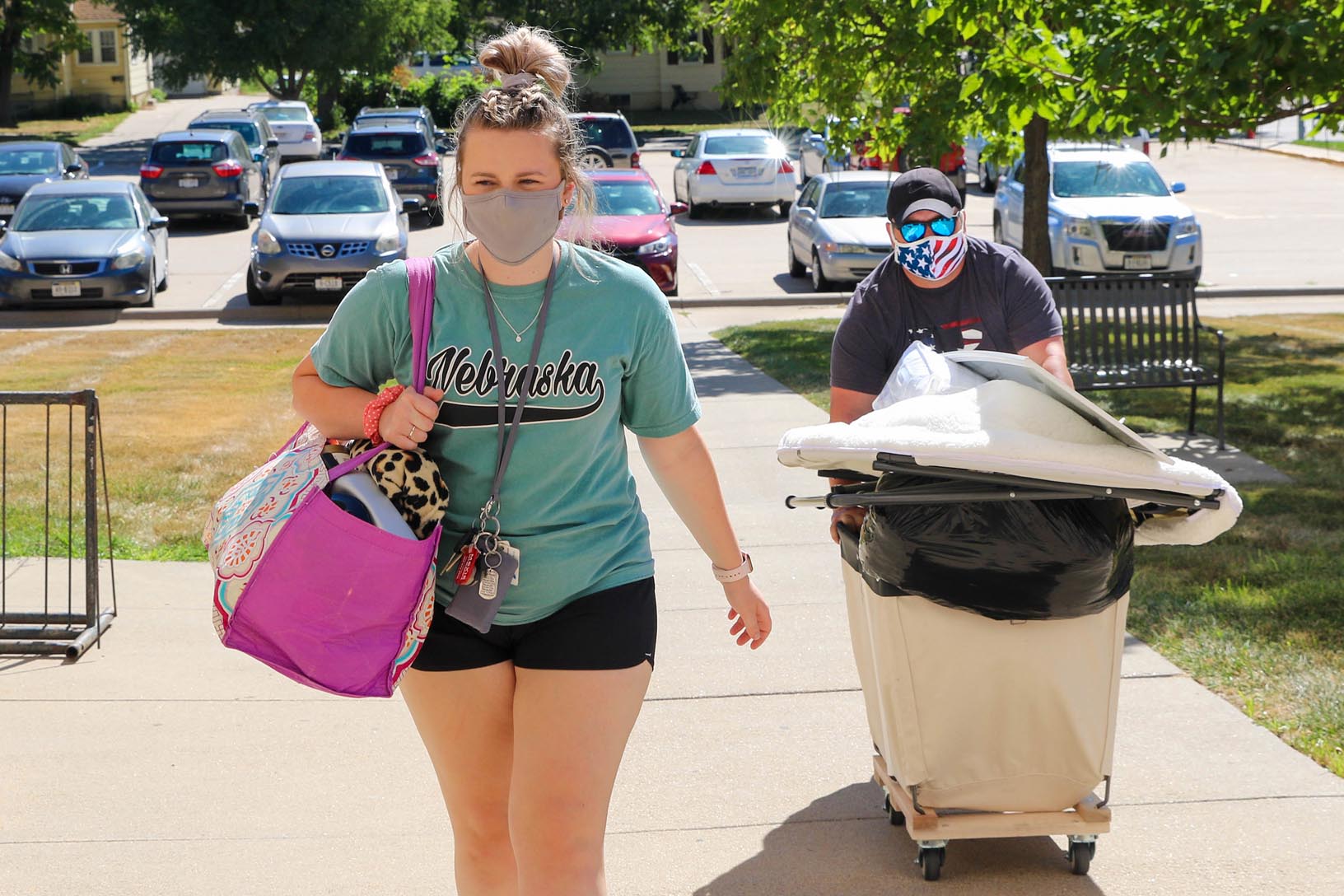 UNK freshman Morgan Bice of Hickman and her father Chad move items into the Centennial Towers East residence hall on Monday morning. Bice will begin classes next week in UNK’s pre-nursing program. (Photos by Todd Gottula, UNK Communications)