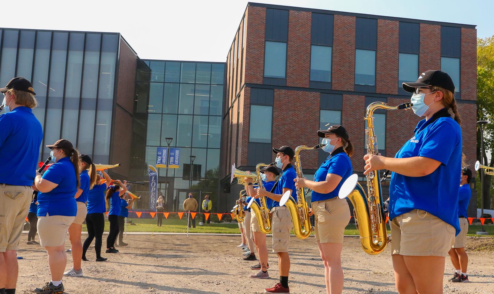 UNK’s Pride of the Plains Marching Band performs Monday during a ribbon-cutting ceremony celebrating the grand opening of Discovery Hall. The event kicked off homecoming week on campus.