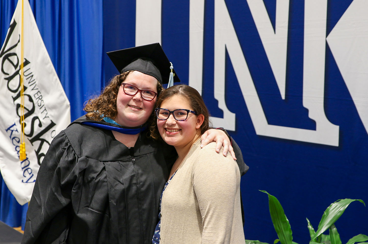 Alecia Amezcua of Madison, left, poses for a photo with her daughter Ariana following Thursday’s commencement ceremony at the University of Nebraska at Kearney. Amezcua graduated from UNK with a master’s degree in Spanish education. (Photos by Todd Gottula, UNK Communications)