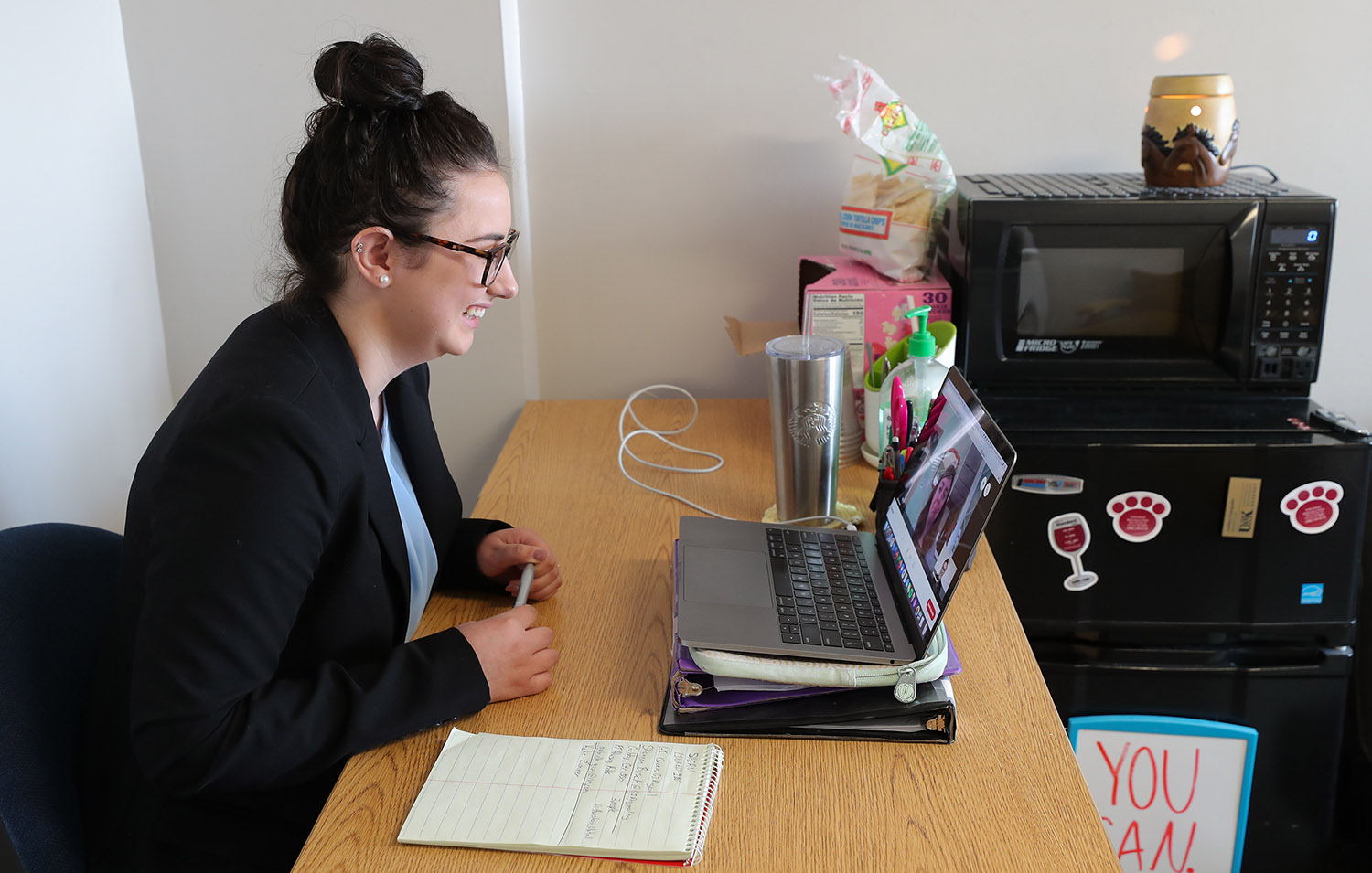 Ashley Einspahr participates in Thursday’s virtual Career and Internship Fair from her residence hall room on the UNK campus. The senior from Arcadia met with employers from across the state. (Photos by Erika Pritchard, UNK Communications)