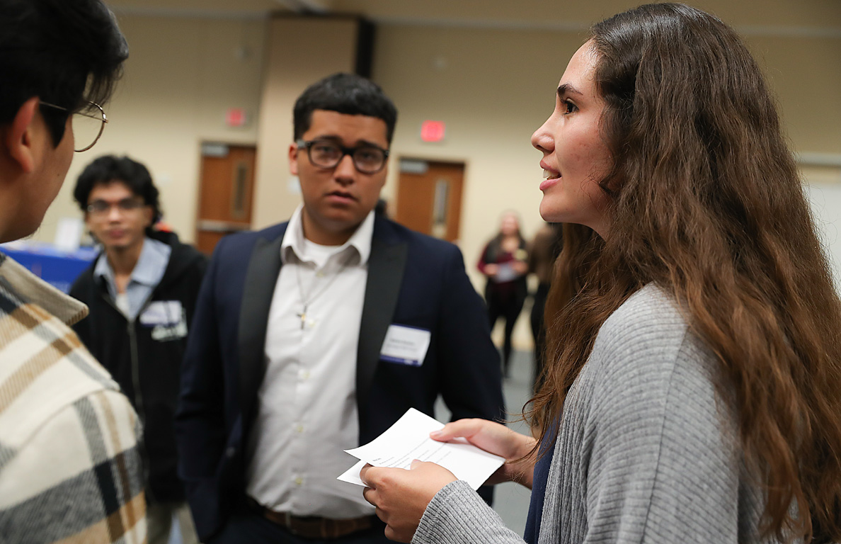 UNK sophomore Elbira Cuin-Avilez, right, leads an icebreaker Friday morning during the 19th annual Nebraska Cultural Unity Conference.
