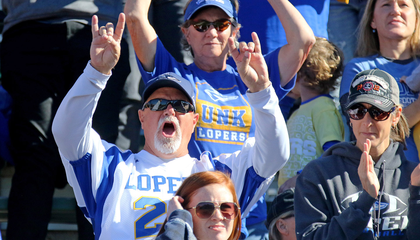Randy Buschkoetter throws the Lopes while cheering on the UNK football team during Saturday’s game at Northwest Missouri State. (Photos by Todd Gottula, UNK Communications)