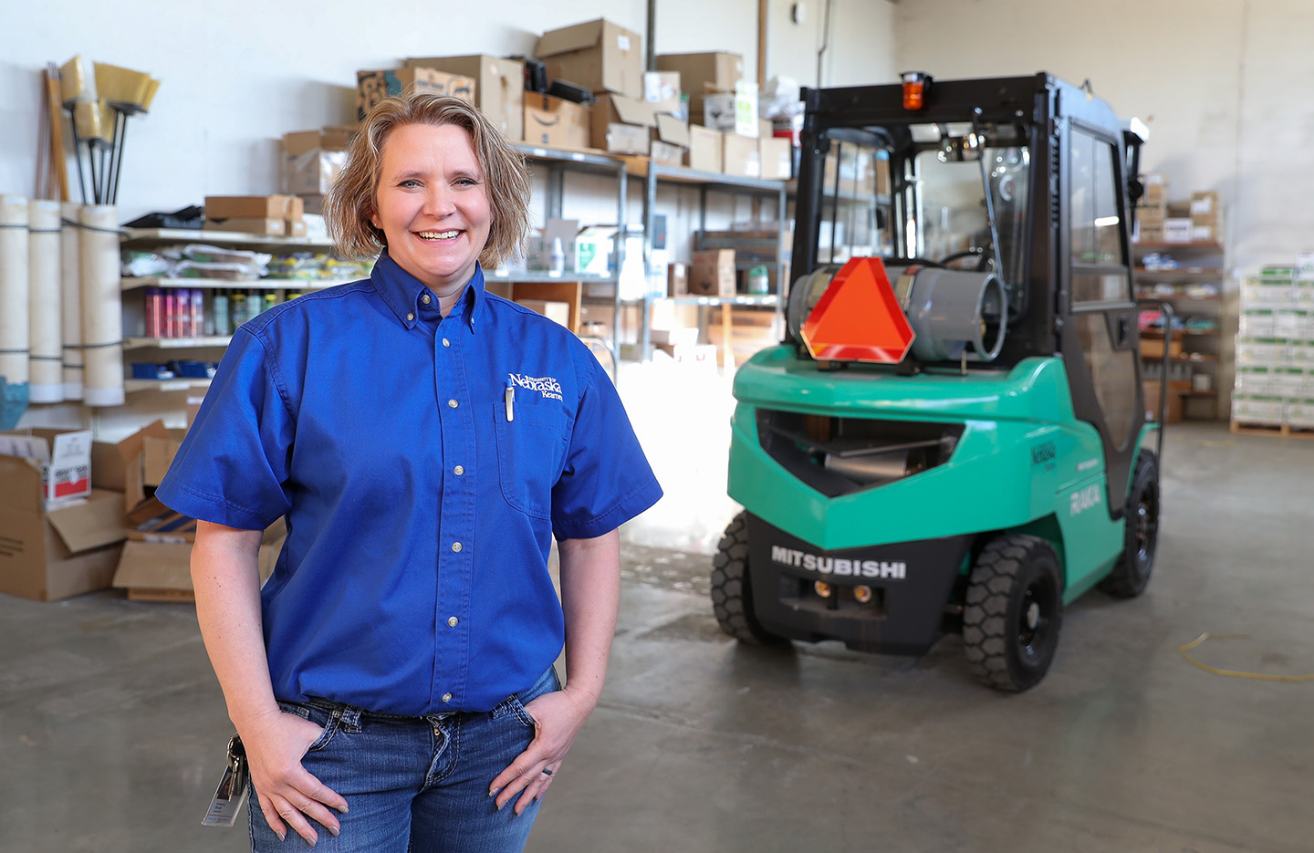 Now a college graduate, Kimberley Orcutt plans to continue working at UNK, where she’s the supply control supervisor with Facilities Management and Planning.