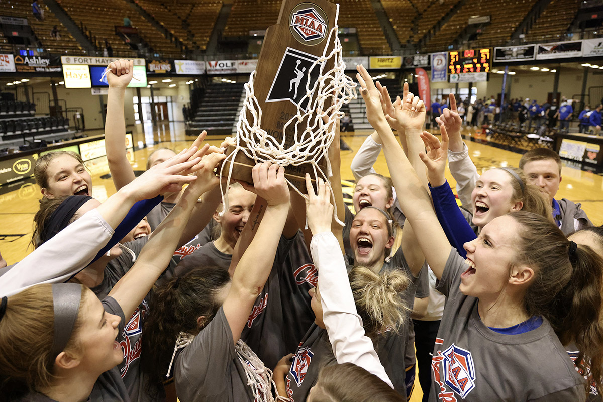 Members of the UNK women’s basketball team celebrate after winning last year’s MIAA tournament title. (Photo by Corbey R. Dorsey, UNK Athletics)