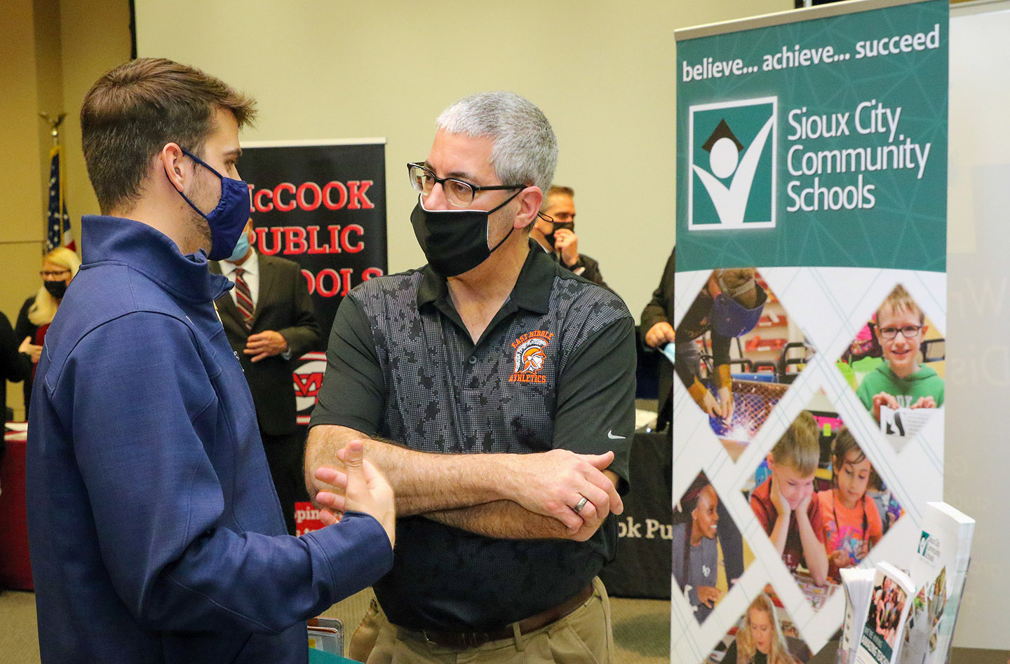 Sioux City East Middle School Principal Tom McGuire, right, discusses job opportunities with a UNK student during Thursday’s education career fair. (Photos by Todd Gottula, UNK Communications)