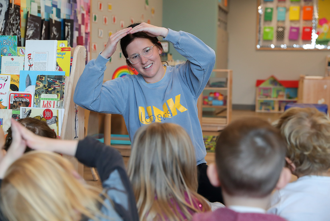 Ellie Snell and other students in assistant professor Beth Mattingly’s music in early childhood education class visit the Plambeck Center once a week during the spring semester to interact with children and teach music lessons.
