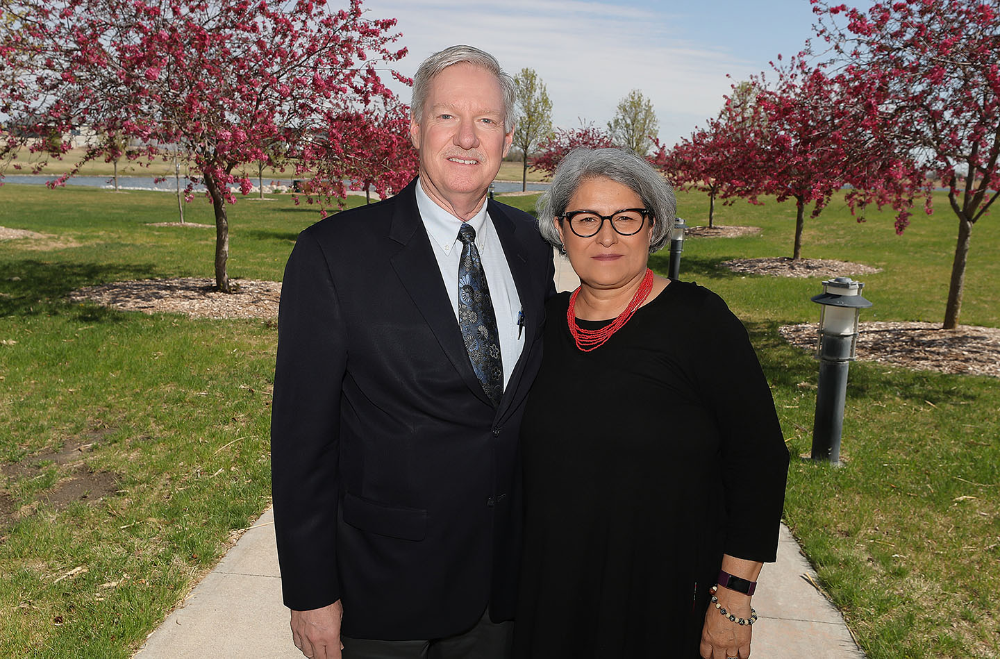 Tom Tye and his wife Mikki pose for a photo at Yanney Heritage Park in Kearney. Tye has been involved in the park’s development since Day 1.