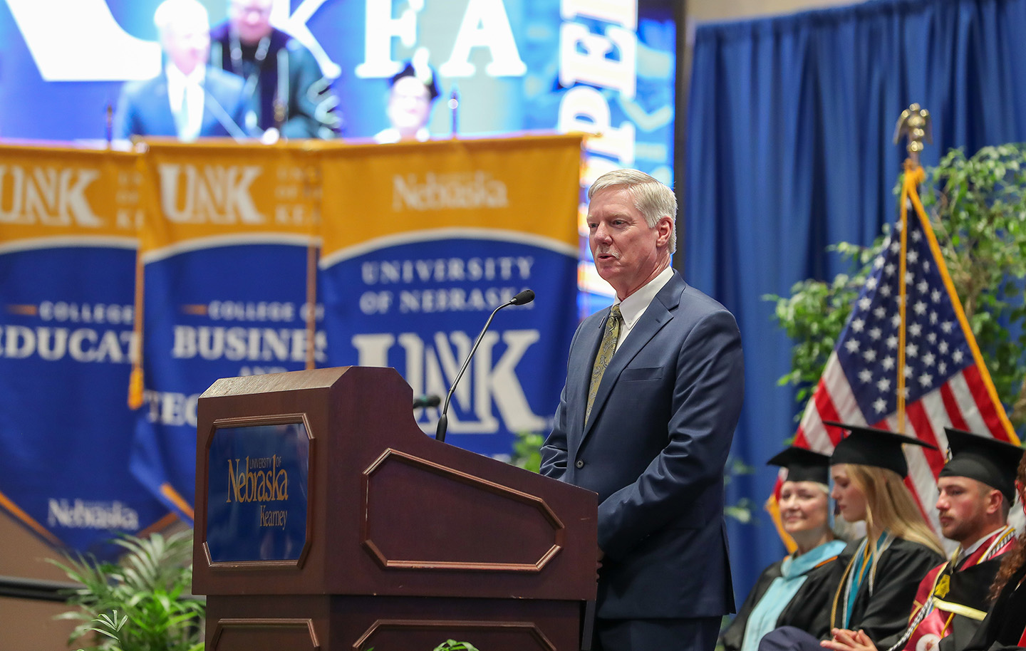 Tom Tye speaks Friday during the spring commencement ceremony at UNK.