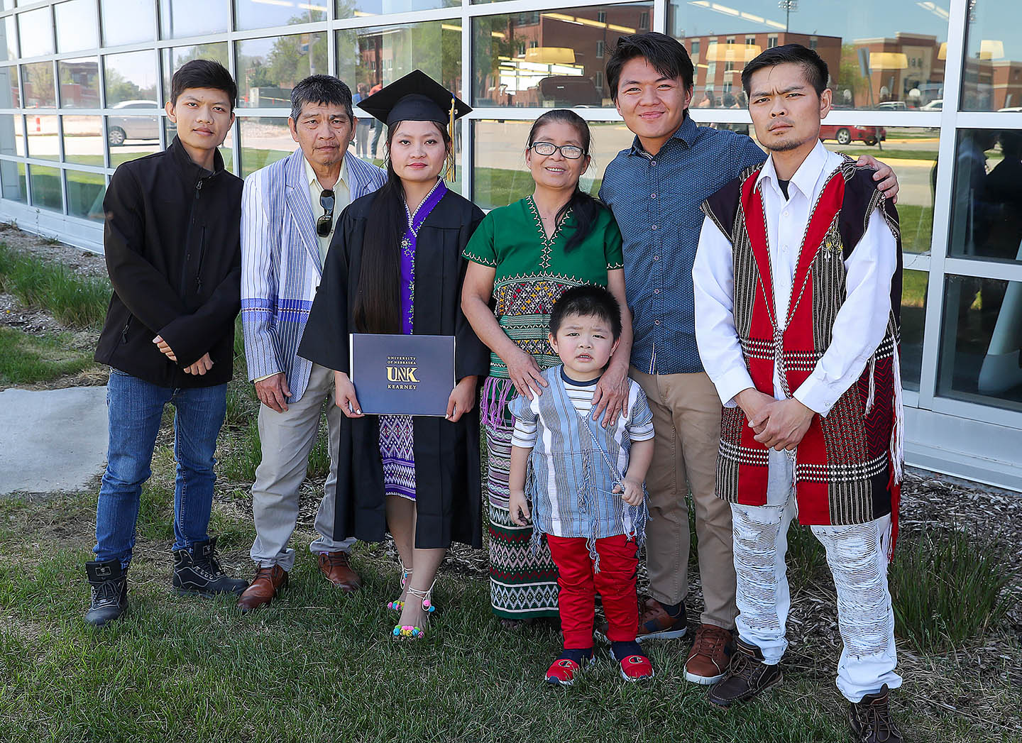 Me Maw poses for a photo with her family Friday after graduating from UNK with a bachelor’s degree in social work.