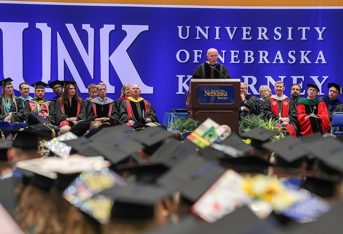 Charlie Bicak delivers the commencement address during last month’s spring graduation ceremony.